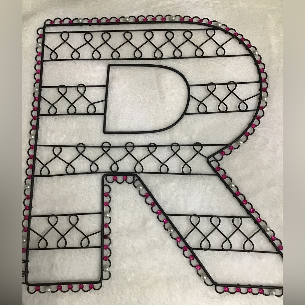The letter R wall hanging earring holder
